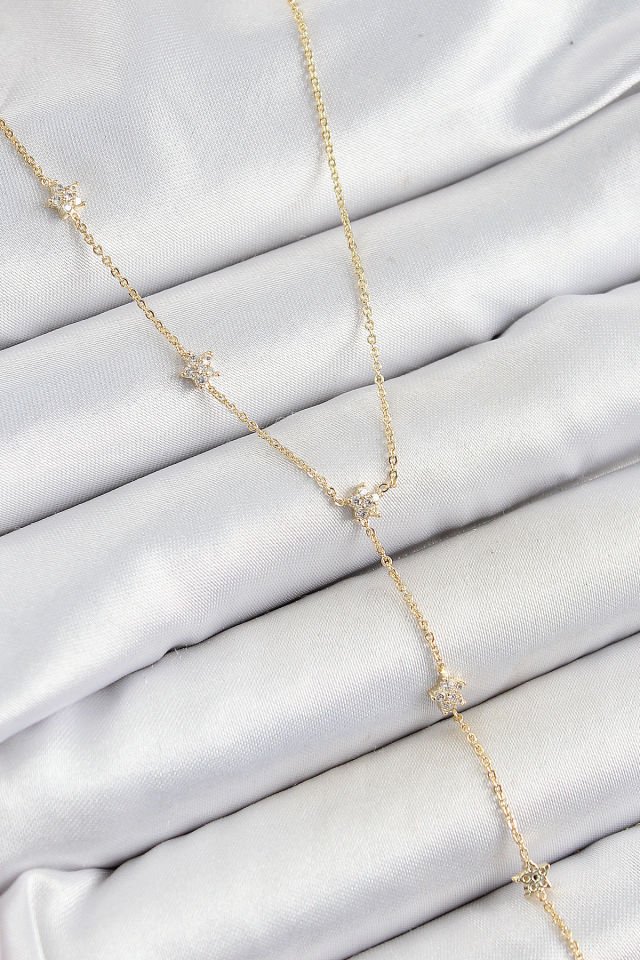 Pirinç Zirkon Taşlı Sıralı Yıldız Figürlü Y Model Gold Renk Kadın Kolye