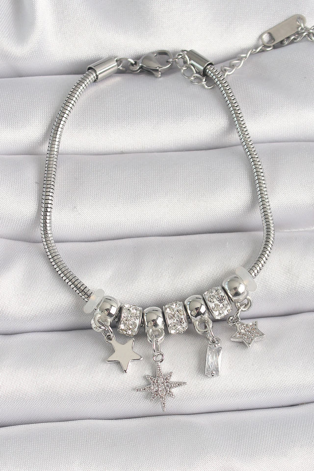 Pirinç Gümüş Renk Zincir Sallantı Zirkon Taşlı Yıldız Model Kadın Bileklik