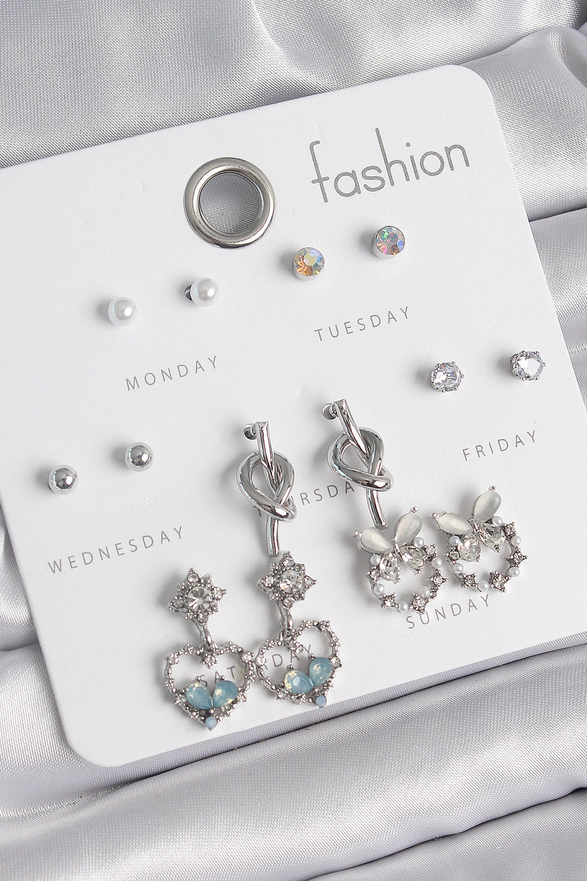 Pirinç Gümüş Renk Sallantı Zirkon Taşlı Kalp Model Düğüm Detay 7 Çift Kadın Küpe Seti