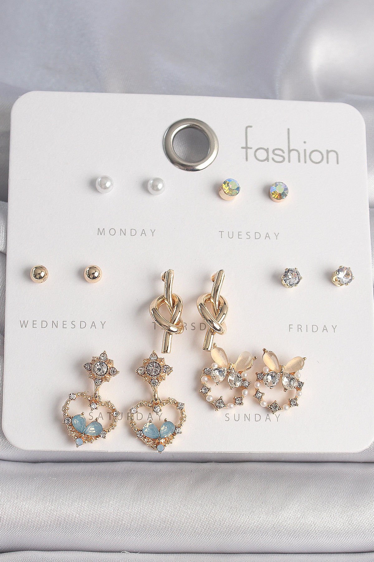 Pirinç Gold Renk Zirkon Taşlı SAllantı Kalp Düğüm Figür 7 Çift Kadın Küpe Seti